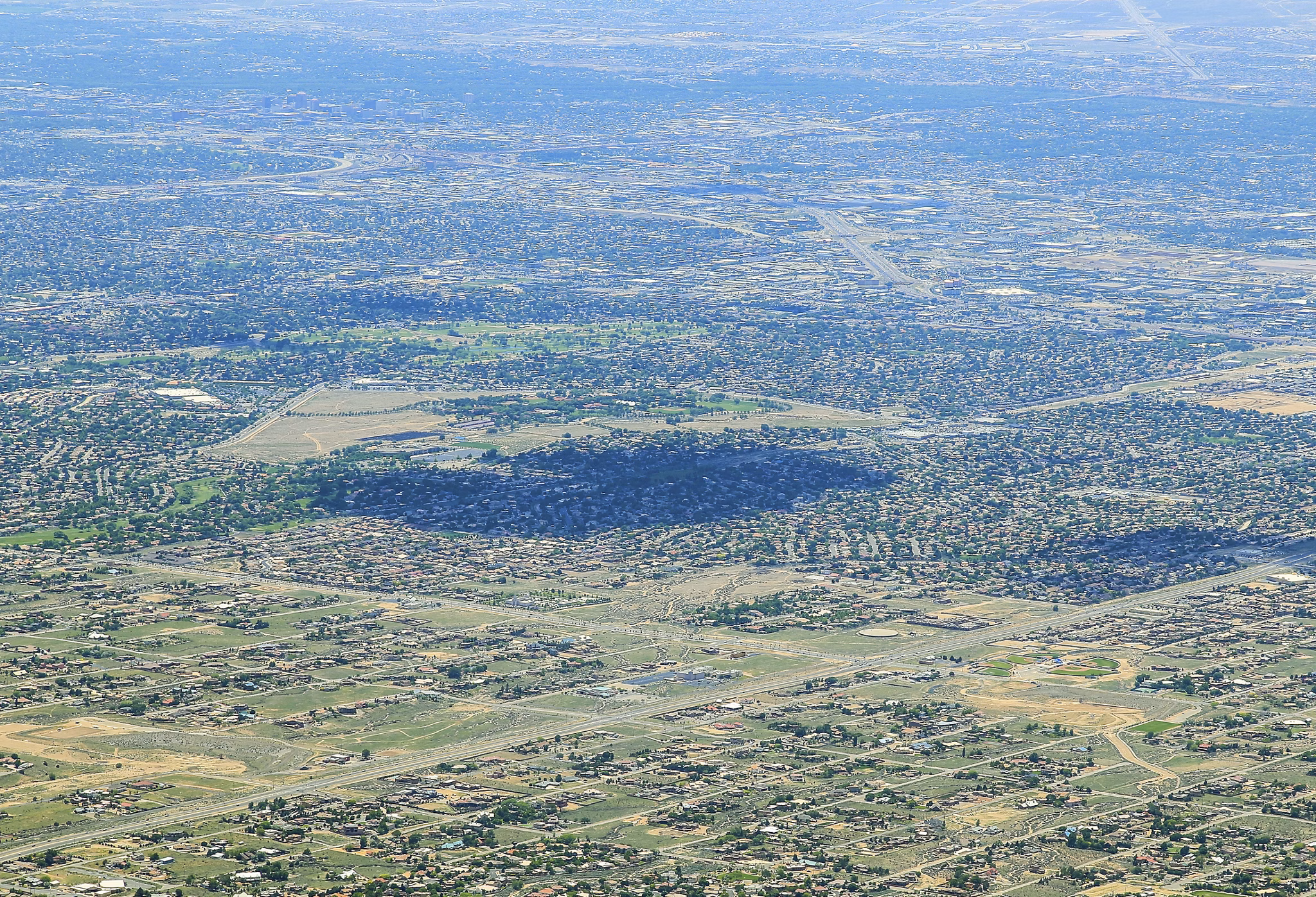 View over Albuquerque, USA, from Sandia Crest with the shadow of cloud above the city.