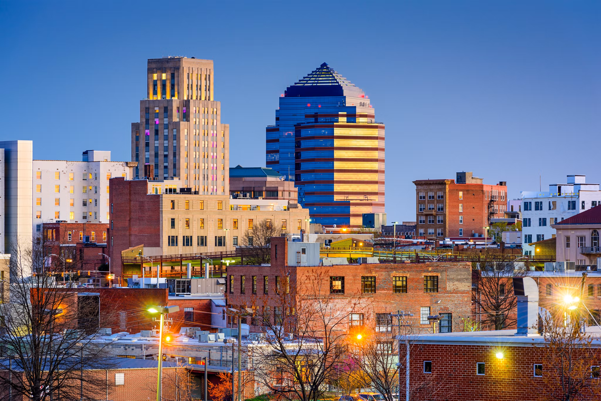 Durham NC cityscape featuring iconic architecture and urban apartments - Research Triangle North Carolina living