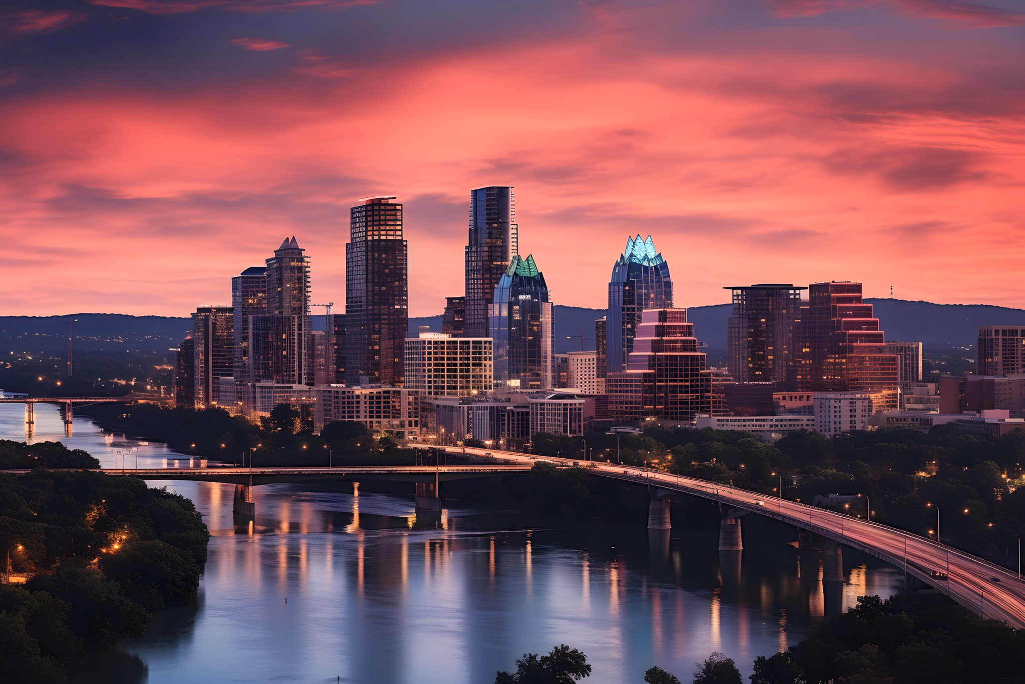 City skyline at sunset in Riverside/East Riverside-Oltorf, Texas, with a river and a bridge in the foreground.