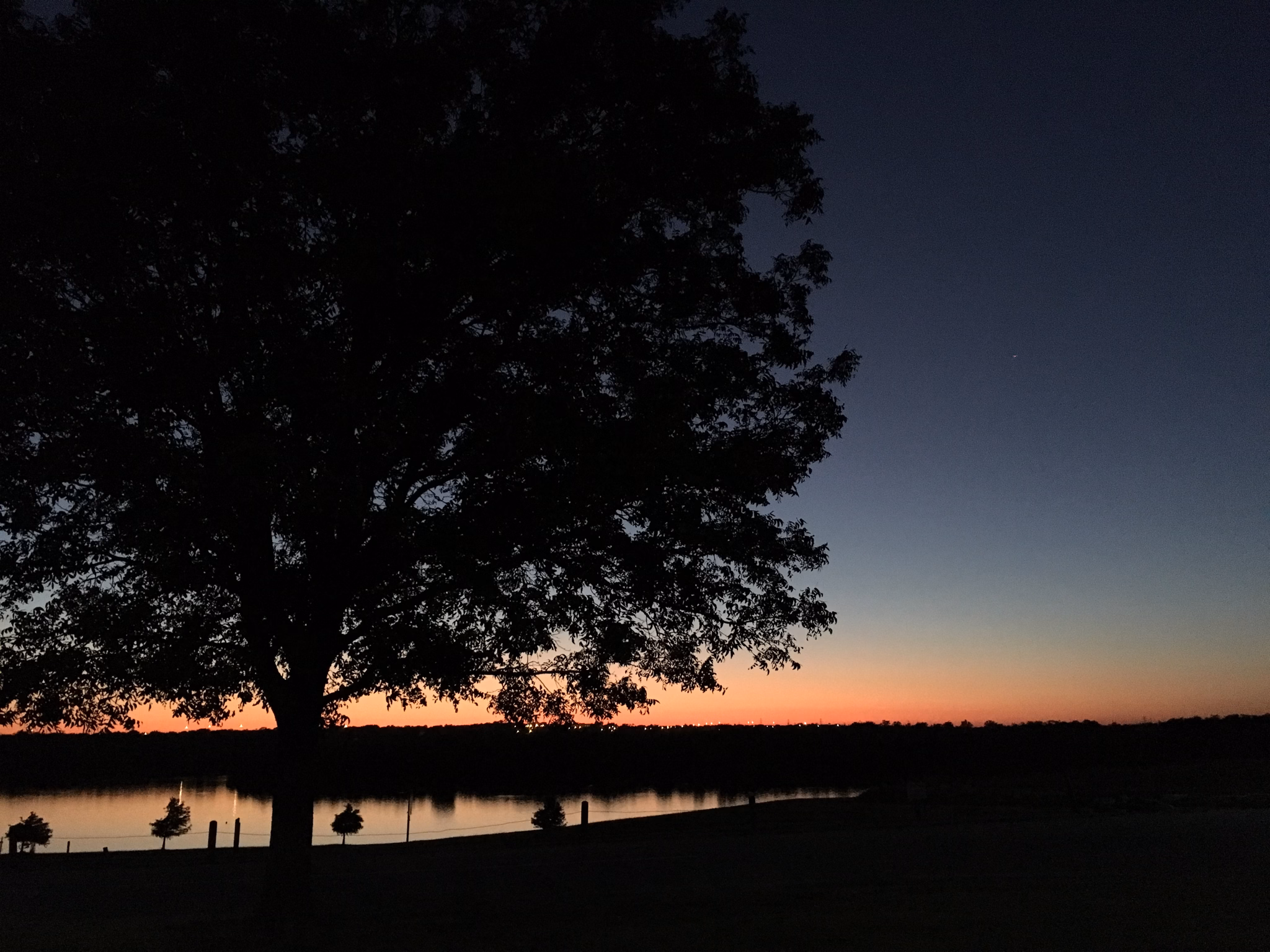 Sunset over lake in the Saginaw/Marine Creek neighborhood in Texas