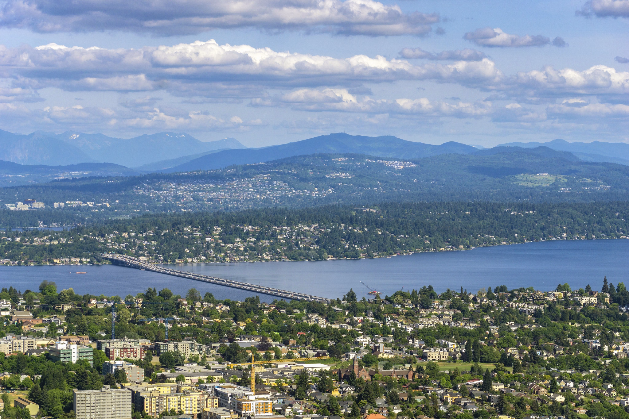 Aerial and remote view of Seattle (Leschi) with the Lacey V Murrow Bridge over Lake Washington and the Mercer Island and Bellevue, Washington state, USA.