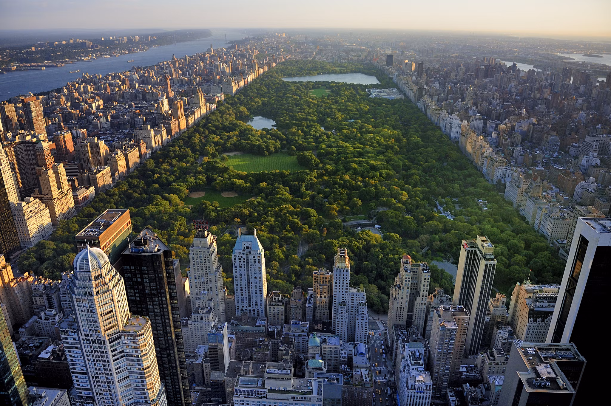 Central Park aerial view, Manhattan, New York; Park is surrounded by skyscraper 