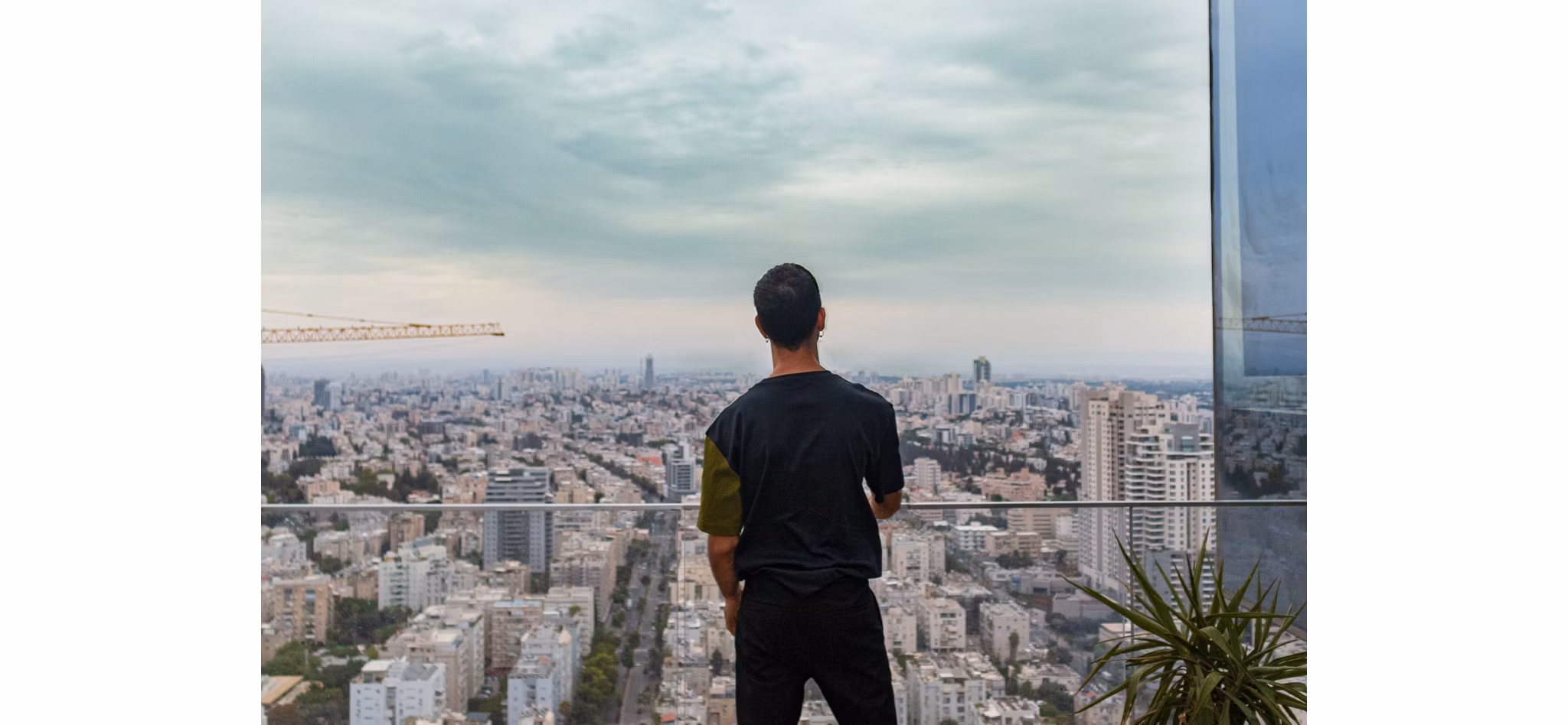 Man Overlooking Beautiful View | Blog | Greystar