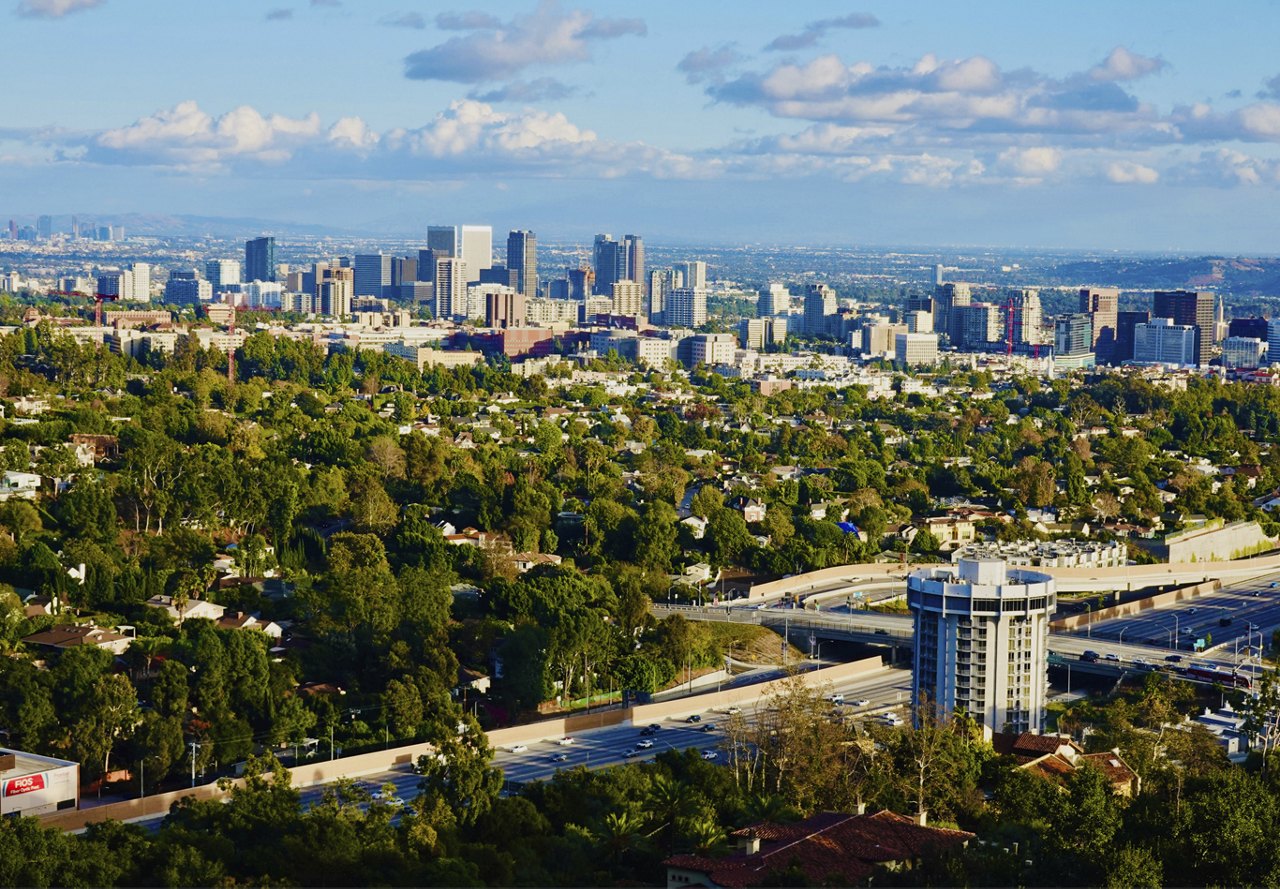 View of Culver City in the Los Angeles area of California, showcasing the cityscape with a mix of buildings and abundant trees.