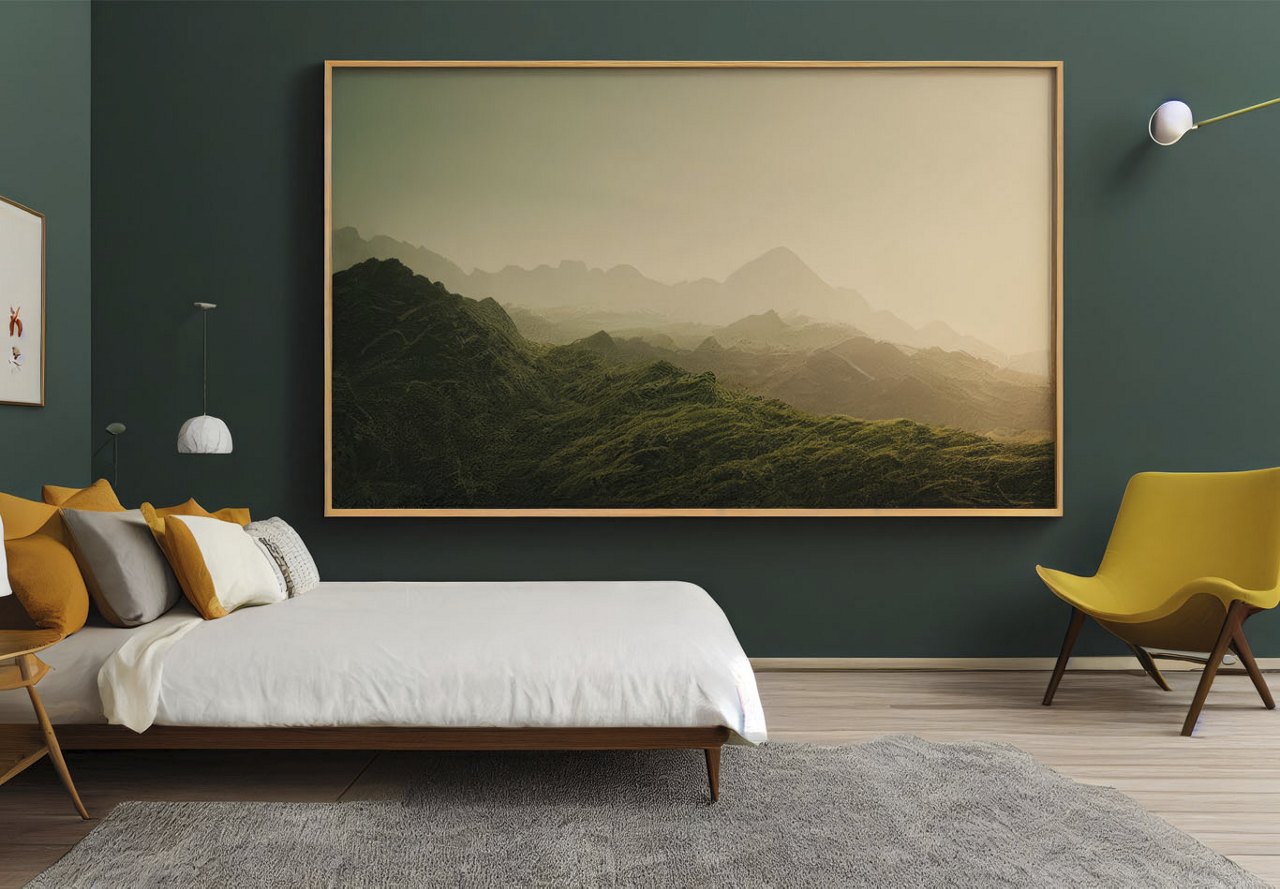  A modern bedroom featuring a deep green wall with a large mountain scene artwork, a yellow chair in the corner, and a bed adorned with plenty of throw pillows, creating a cozy and stylish atmosphere.