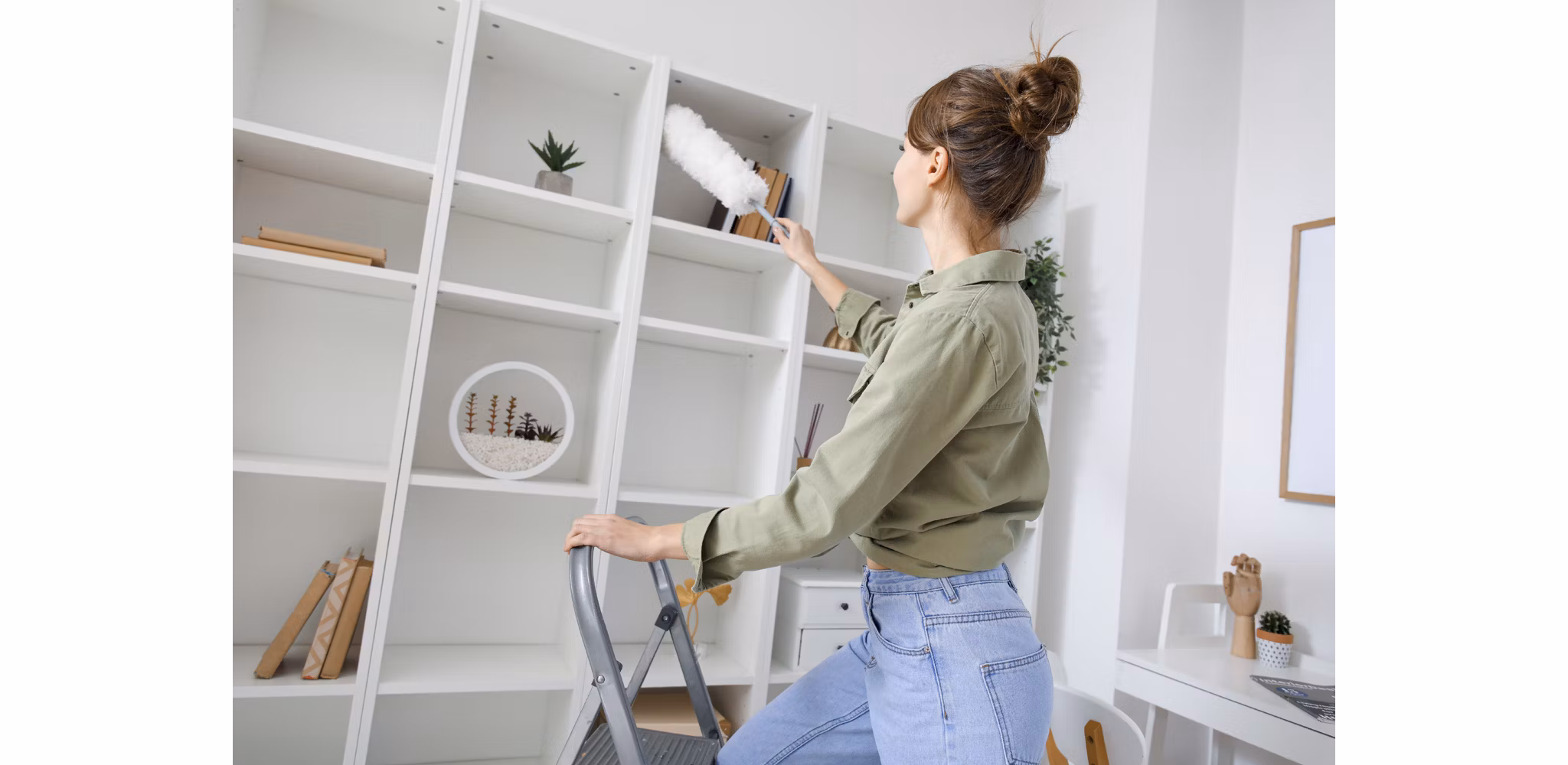 girl dusting shelf