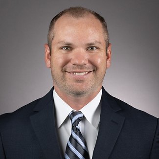 Greystar employee in formal attire
