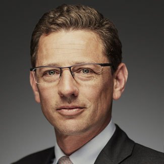Employee headshot of a smiling person
