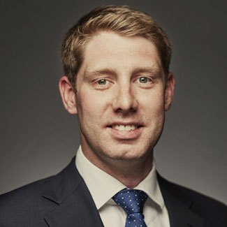 Employee headshot of a smiling person