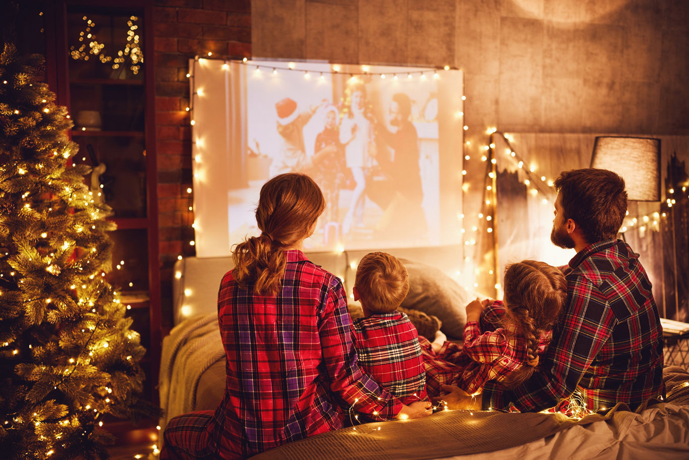Family in Matching Pajamas Watching Movie | Blog | Greystar
