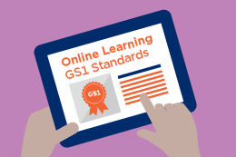 Hands Holding a Tablet Open to GS1 Online Learning