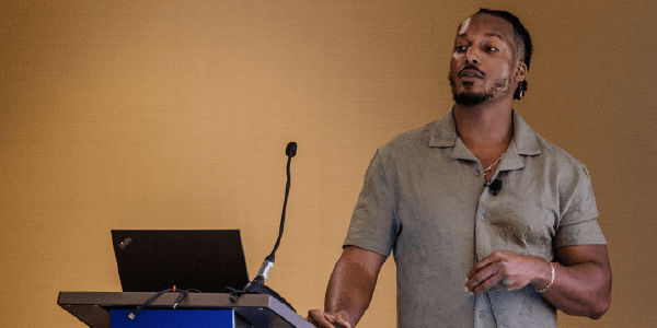 Conference speaker at podium