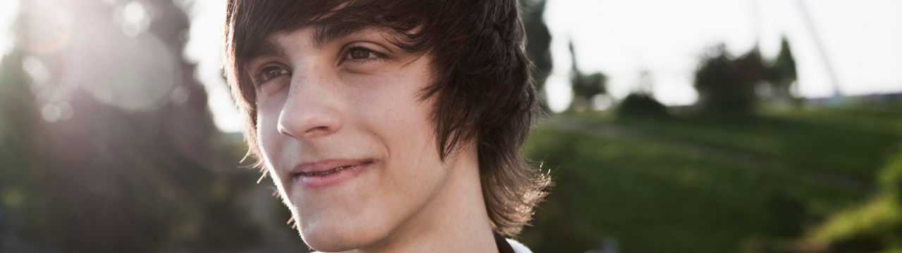 Germany, Berlin, Teenage boy with headphones