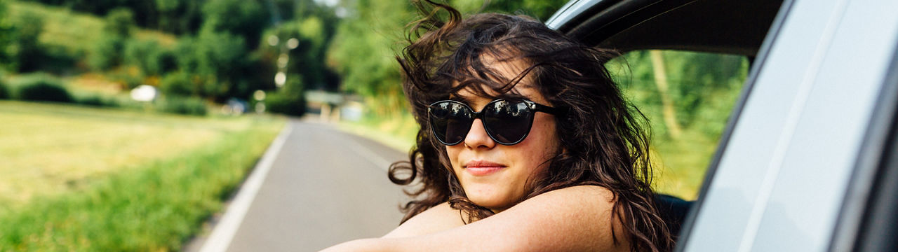 Beautiful woman with her hair blowing in the wind