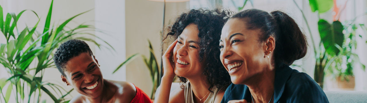 Happy beautiful hispanic south american and black women meeting indoors and having fun - Black adult females best friends spending time together, concepts about domestic life, leisure, friendship and togetherness