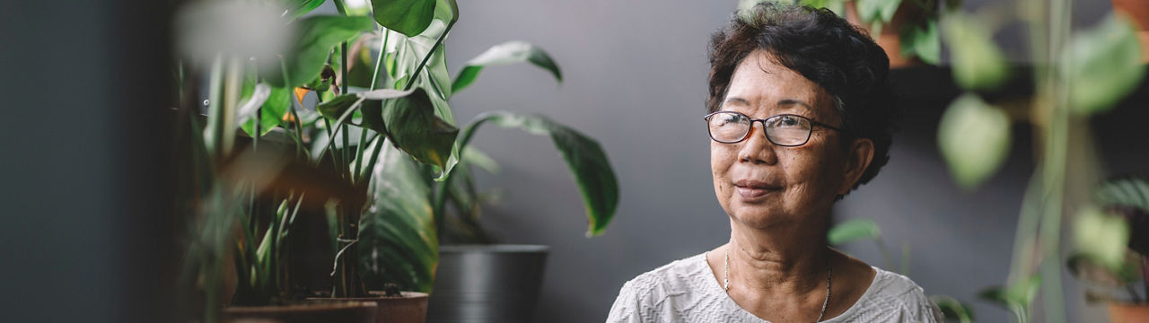 Grandmother sitting at home alone