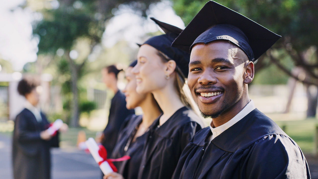 Portrait university student, black man and graduation celebration, event and achievement of goals, education success and motivation. Happy, excited and smile african college graduate celebrate future