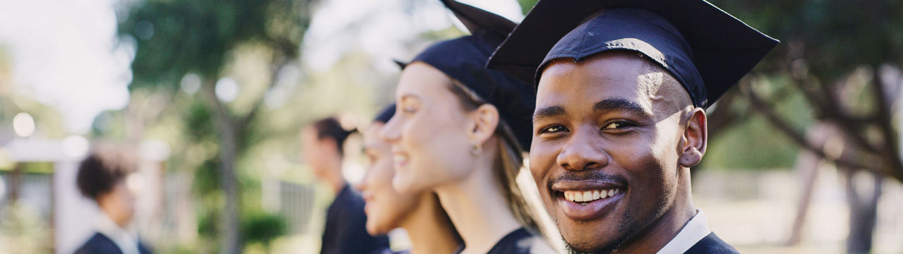 Portrait university student, black man and graduation celebration, event and achievement of goals, education success and motivation. Happy, excited and smile african college graduate celebrate future