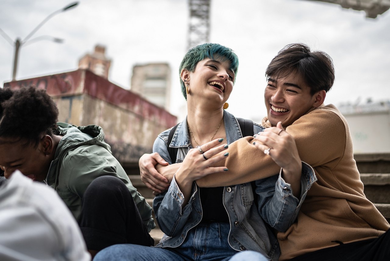 Friends talking in the street