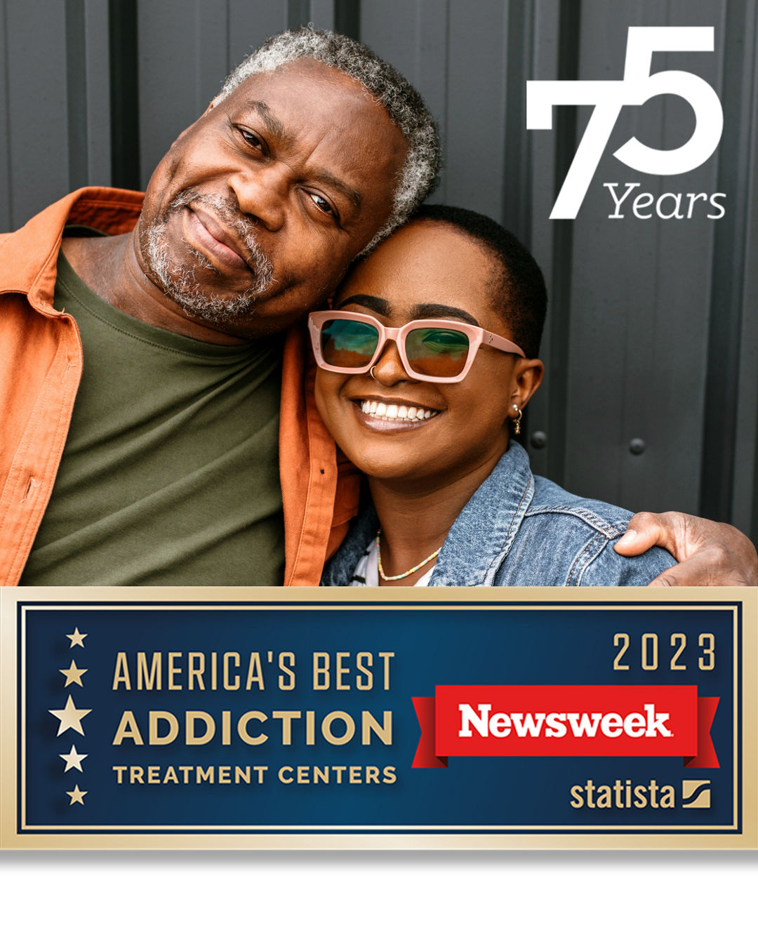 Two adults embracing and the 75th year anniversary logo