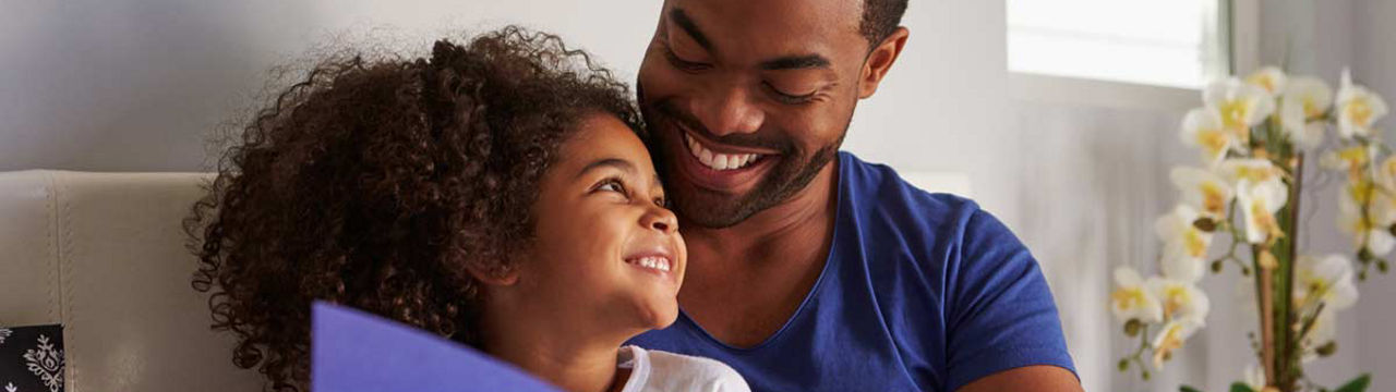 Parent and child reading together