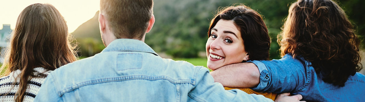 Cropped shot of friends outdoors