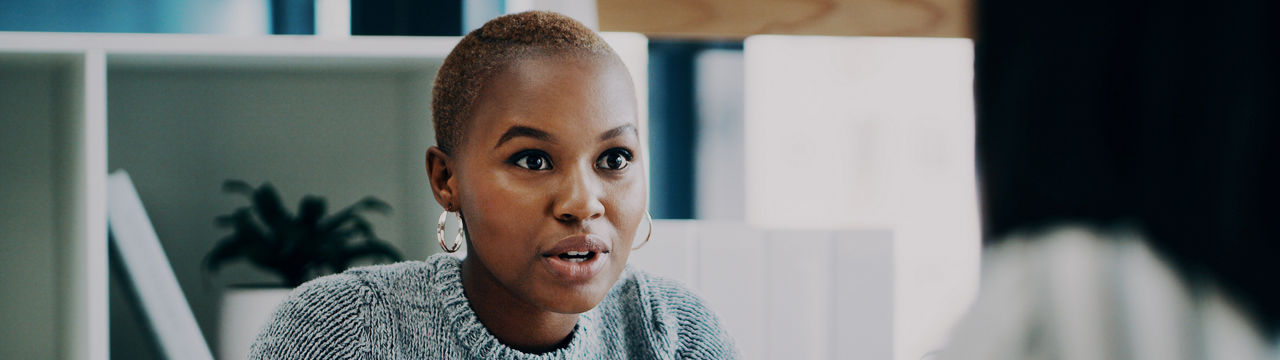 Young business woman talking.