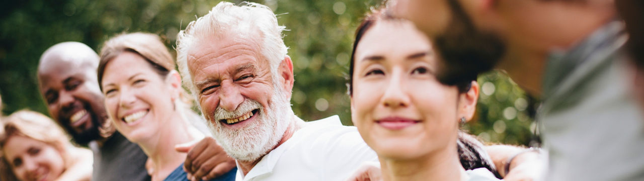 Happy diverse people together in the park