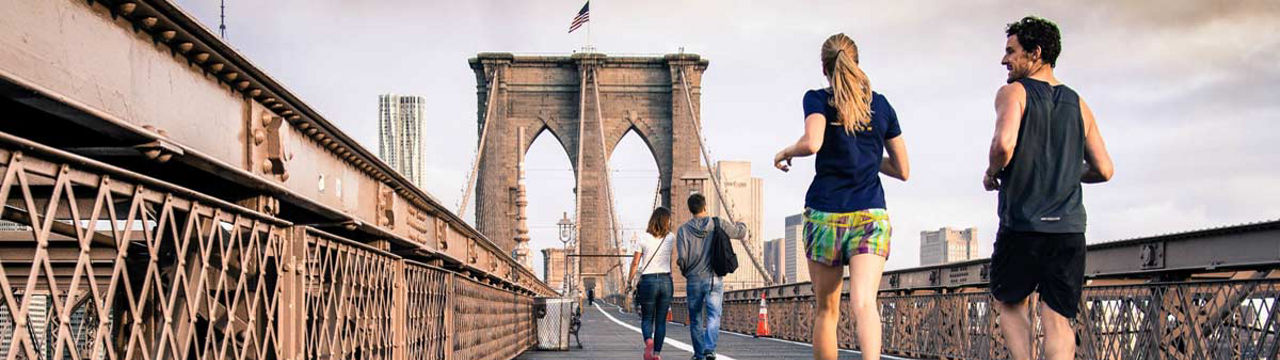 joggers on bridge