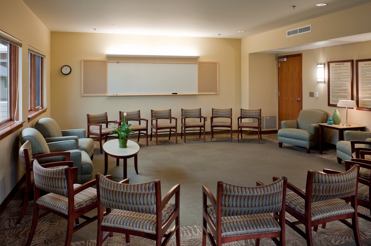 Inside a group room with chairs and windows