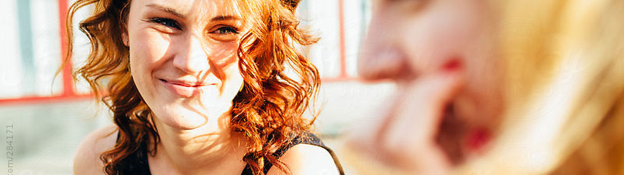 Red Headed Woman Smiling