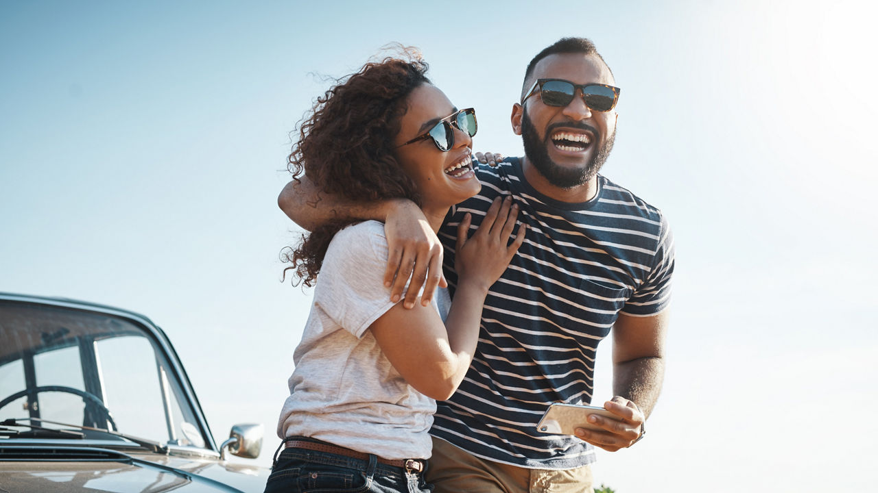 Shot of a young couple enjoying a summerâ  s road trip together