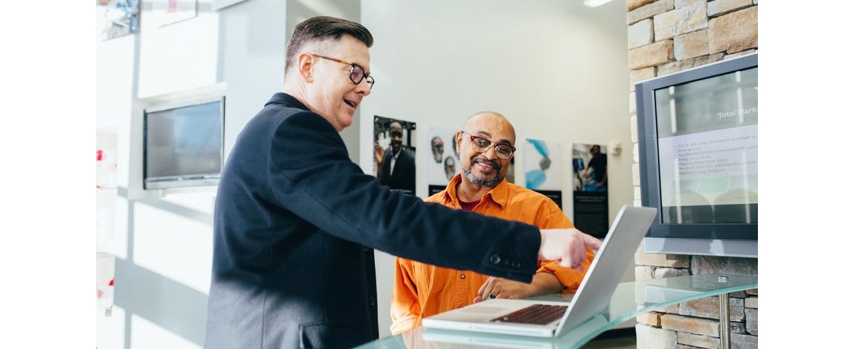 Insurance agent with business owner