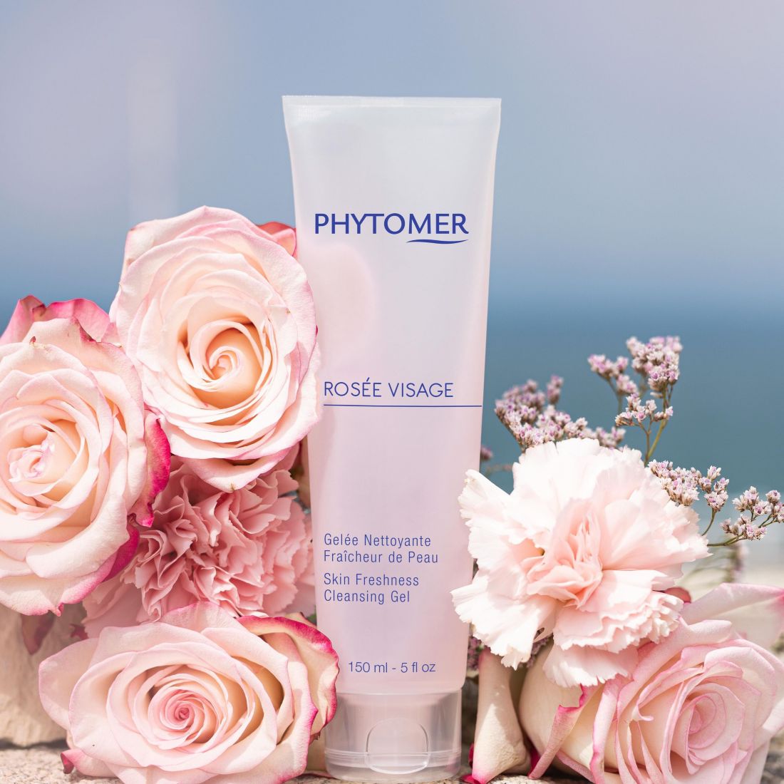 Phytomer products surrounding by flowers