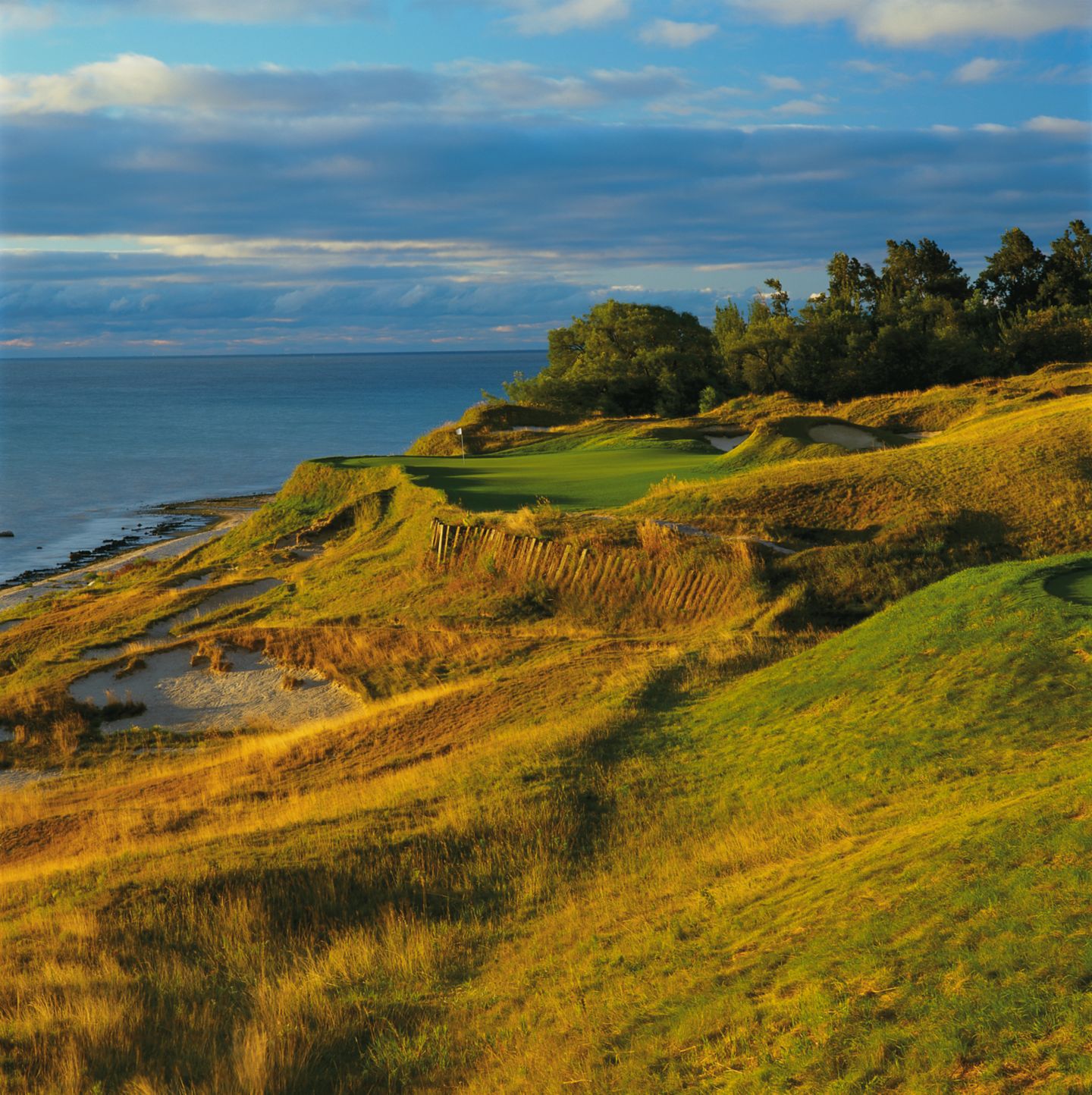 The green of hole 17 on the Straits Course with Lake Michigan on the left. 