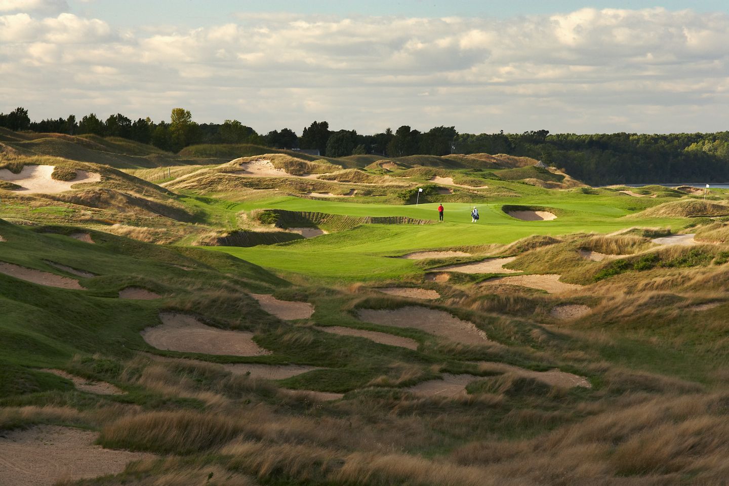 The bunkers with golfers on the eleveth hole of the Straits Course at Whistling Straits. 