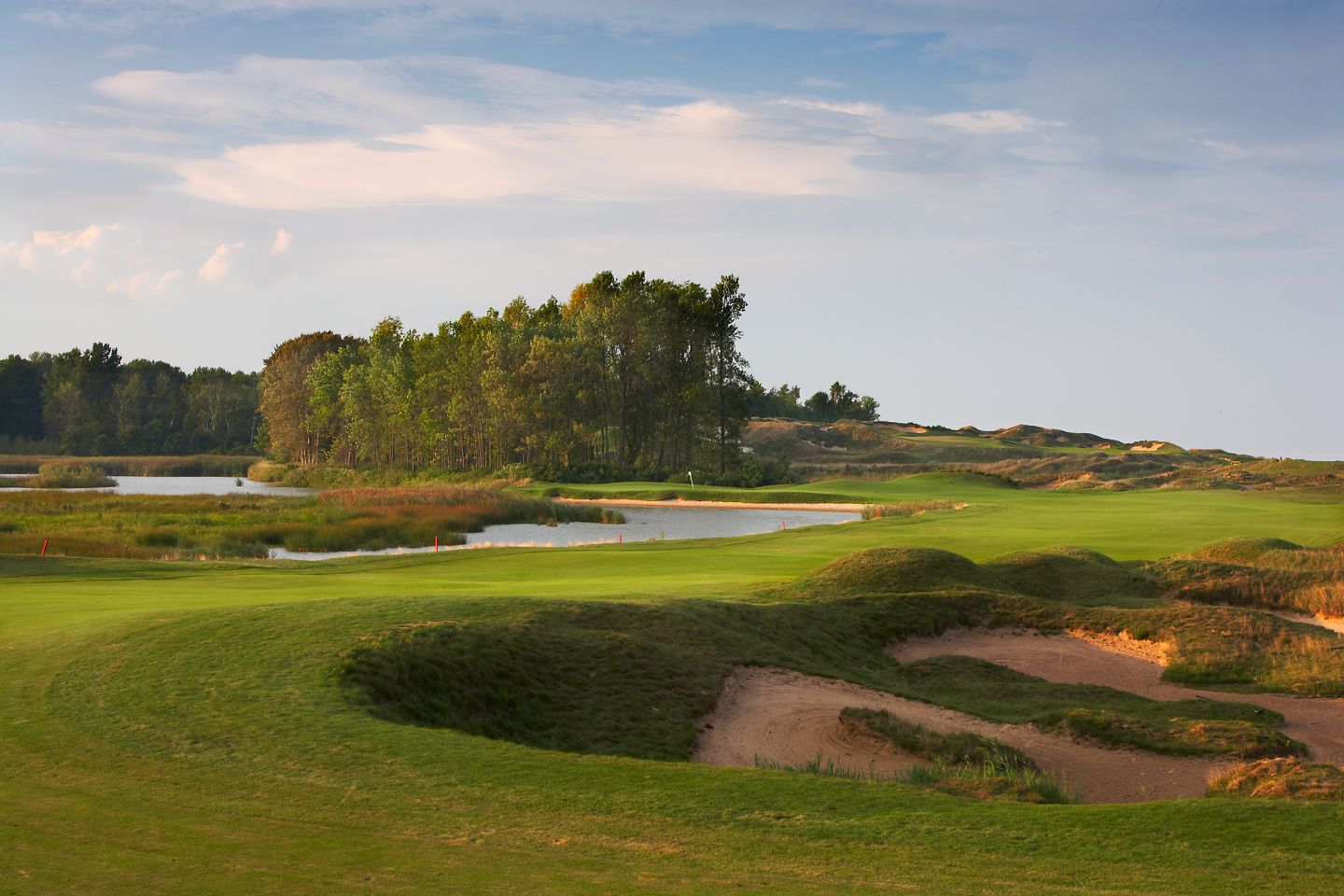 The fifth hole on the Straits Course at Whistling Stratis is the longer of the two par 5s on the front nine,  demanding accuracy from tee to green.