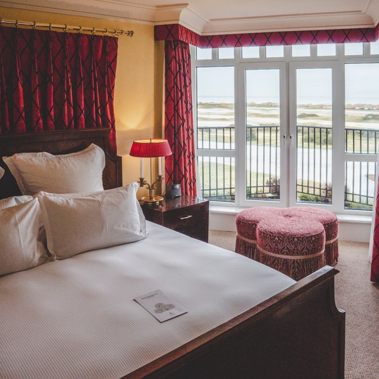 Luxurious bedroom with a view of the Old Course at the Old Course Hotel, Golf Resort & Spa