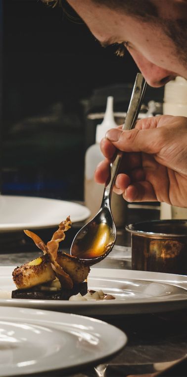 Chef preparing the dish in the Road Hole Restaurant