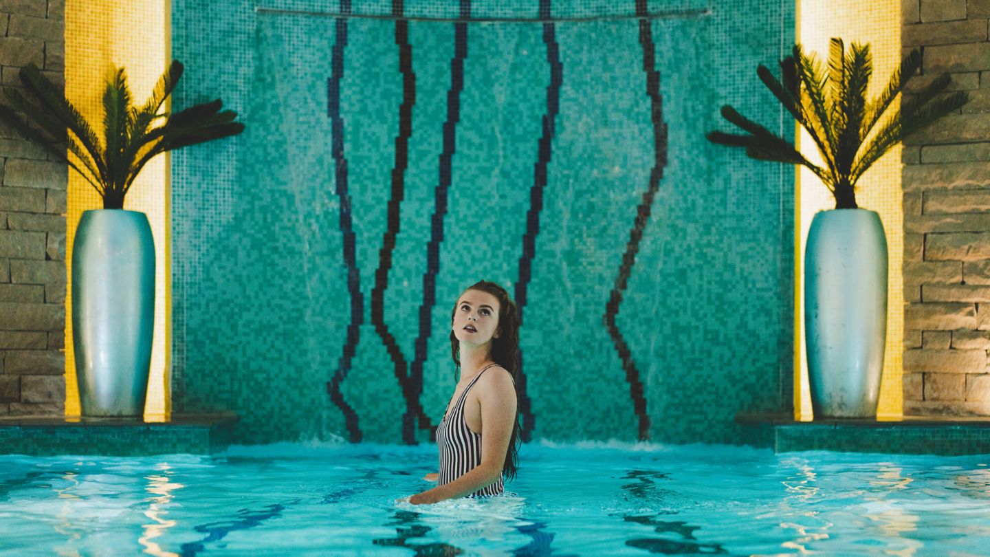 Woman enjoying the spa pool at Kohler Waters Spa, St Andrews