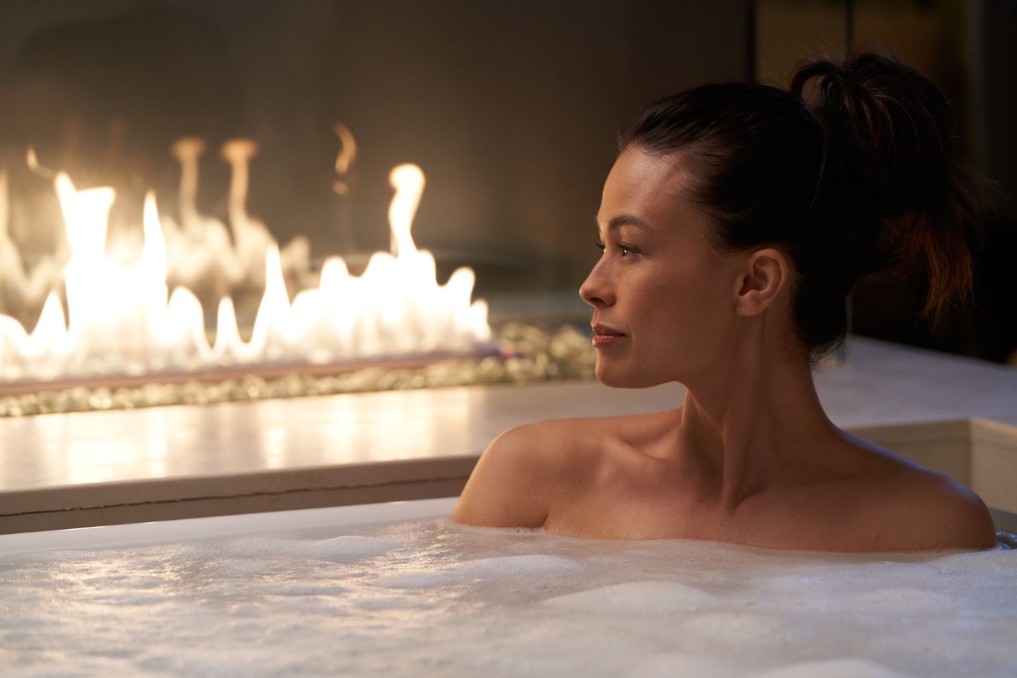 a woman in a bathtub