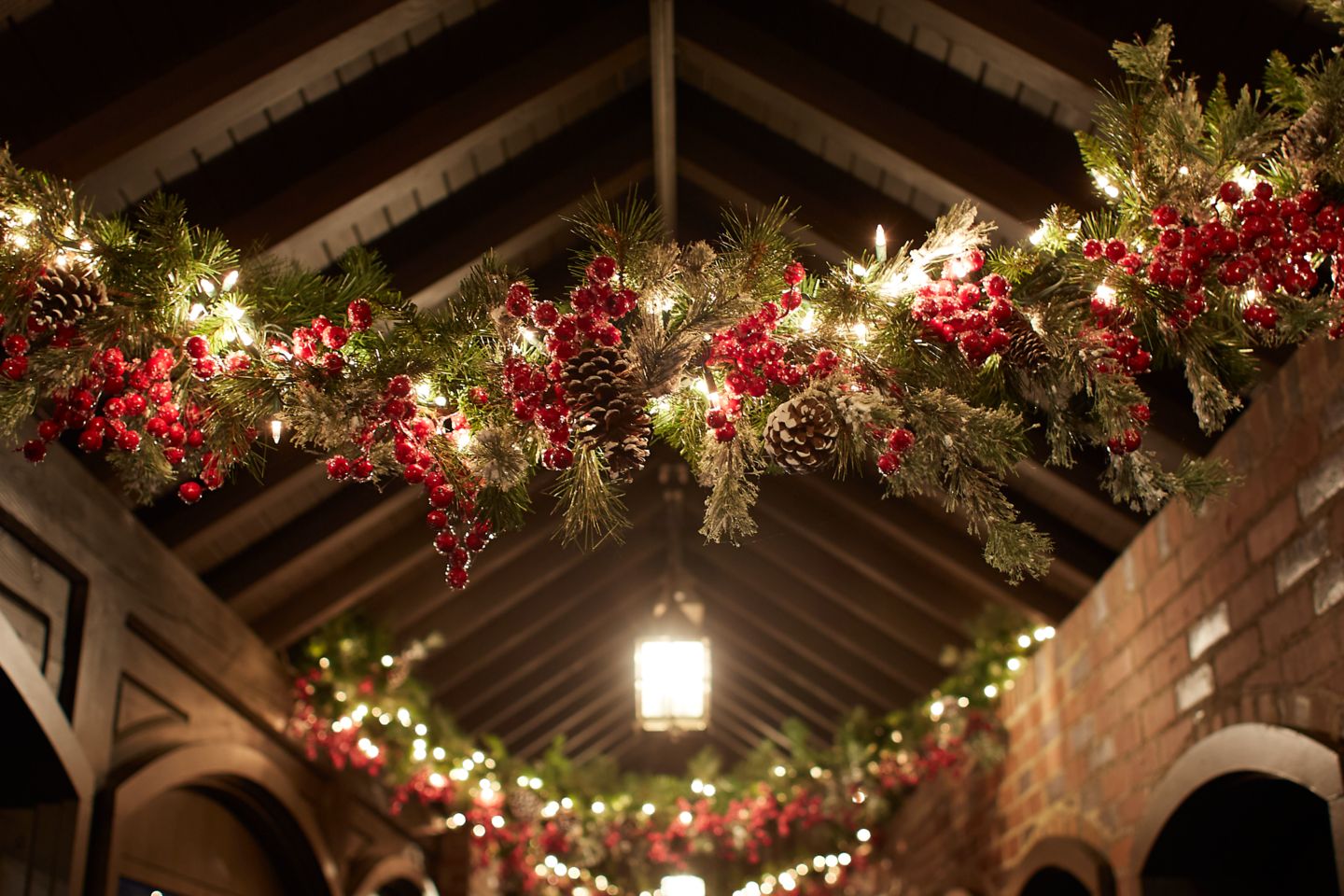 holiday garland hanging from the ceiling