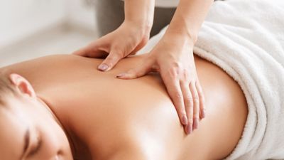 Woman receiving a massage at Kohler Waters Spa, St Andrews