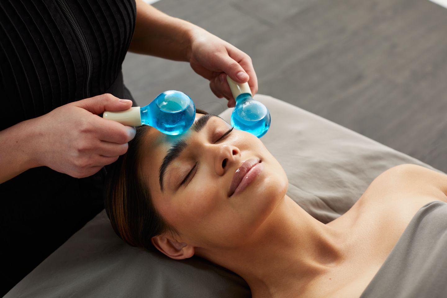 a lady receiving a facial