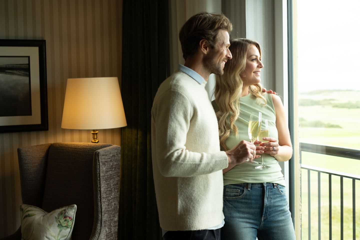 Glass of fizz in the bedroom