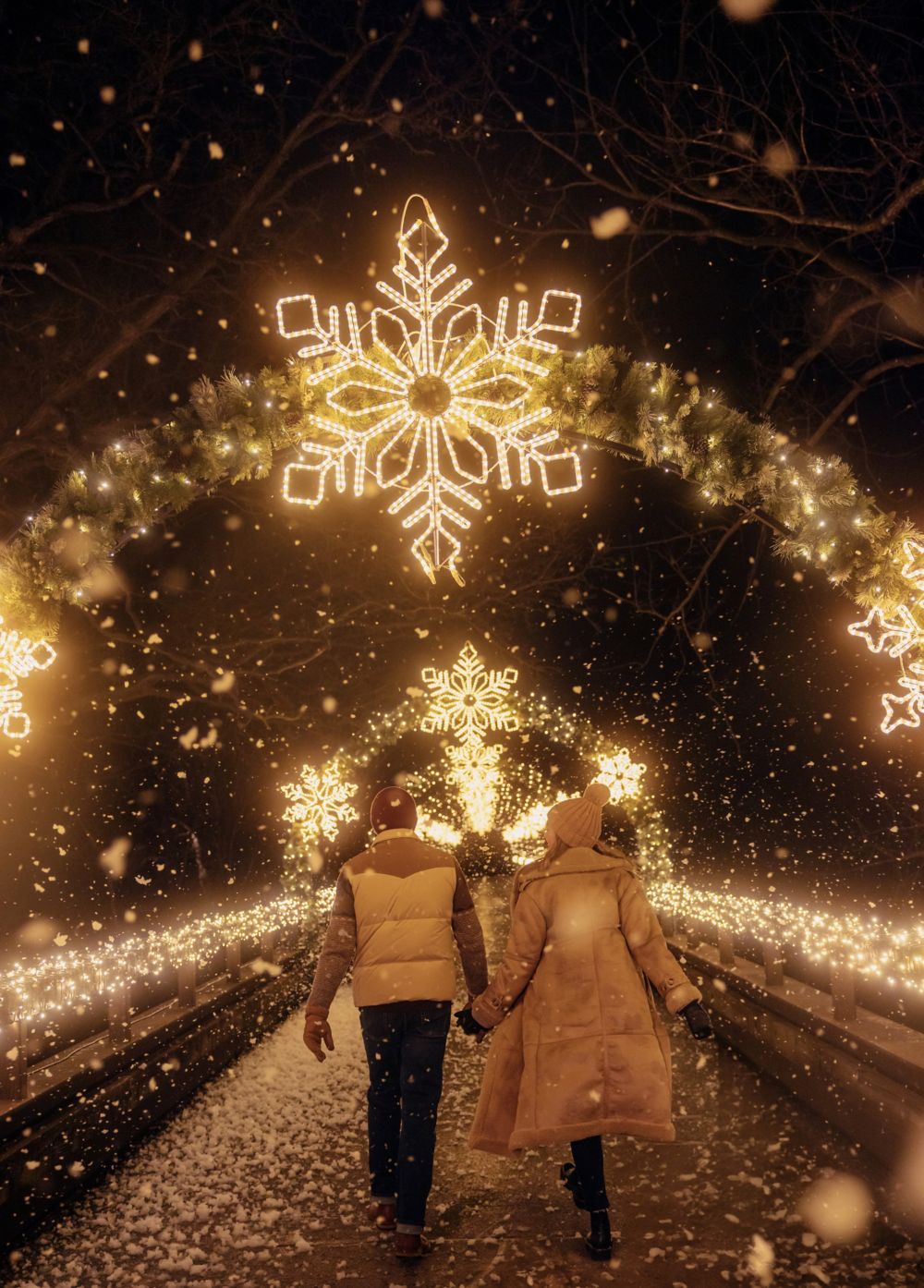 a couple walking down an enchanting walk way