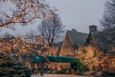 The American Club exterior with holiday lights