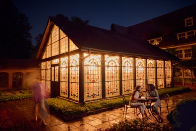 ladies socializing outside The Greenhouse