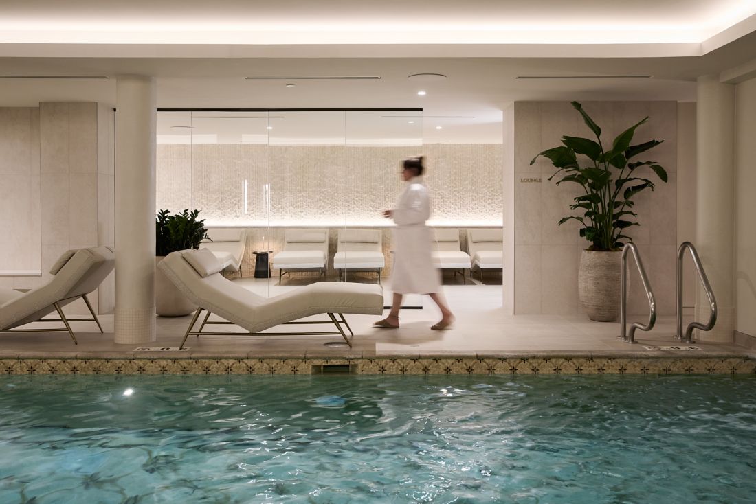 a woman in a calming spa pool environment