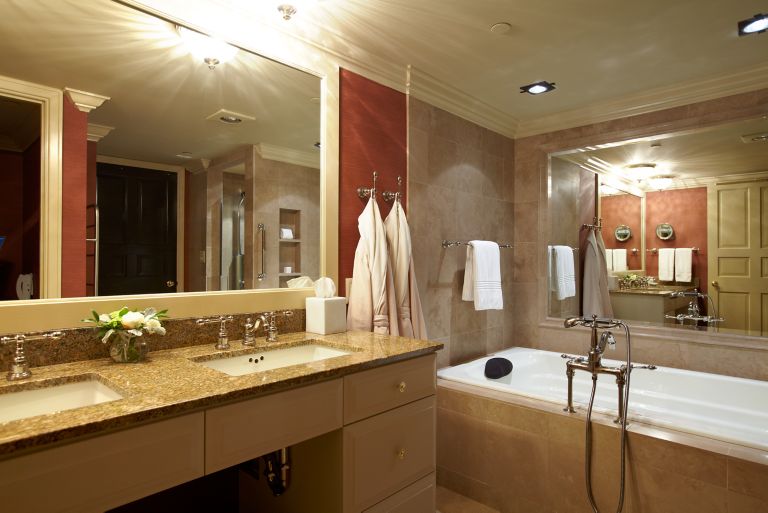 a bathtub and double vanity